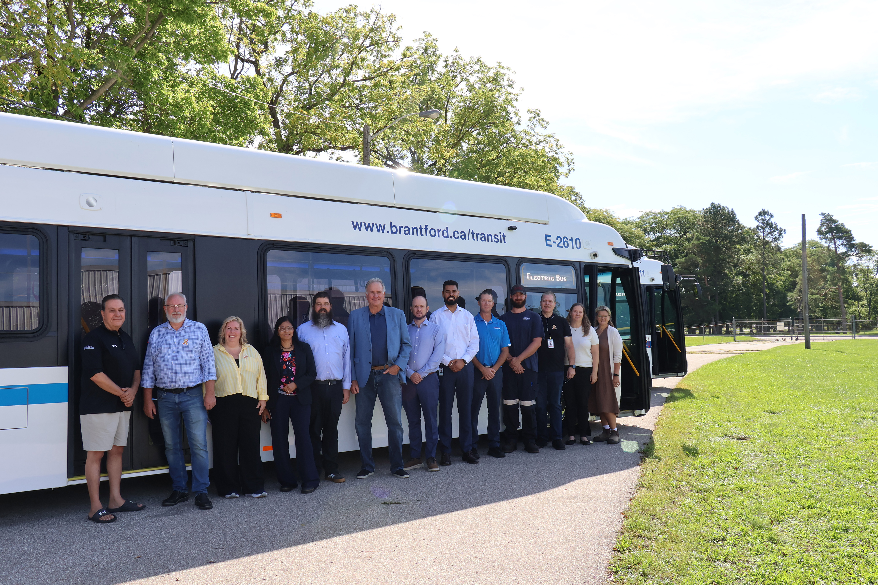 Members of Brantford City Council and City of Brantford staff gather with Brantford Transit’s first battery electric buses at the Transit Services Centre.
