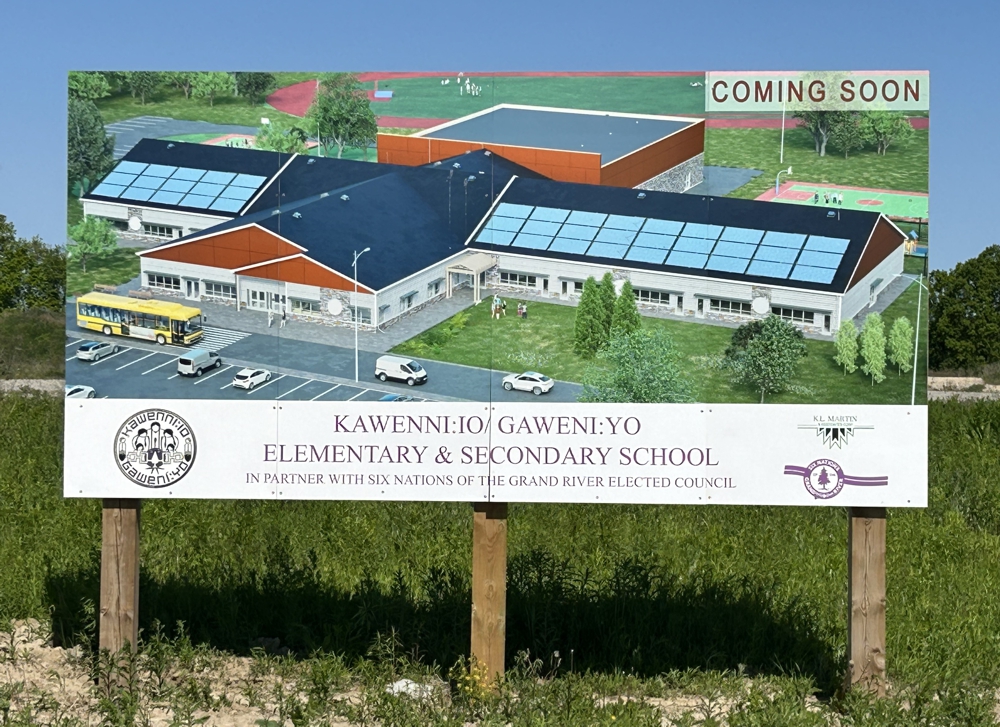 An artist's conception of the new KAWENNÍ:IO/GAWENÍ:YO SCHOOL taken from the bill board on the lot of where the new school is to be built