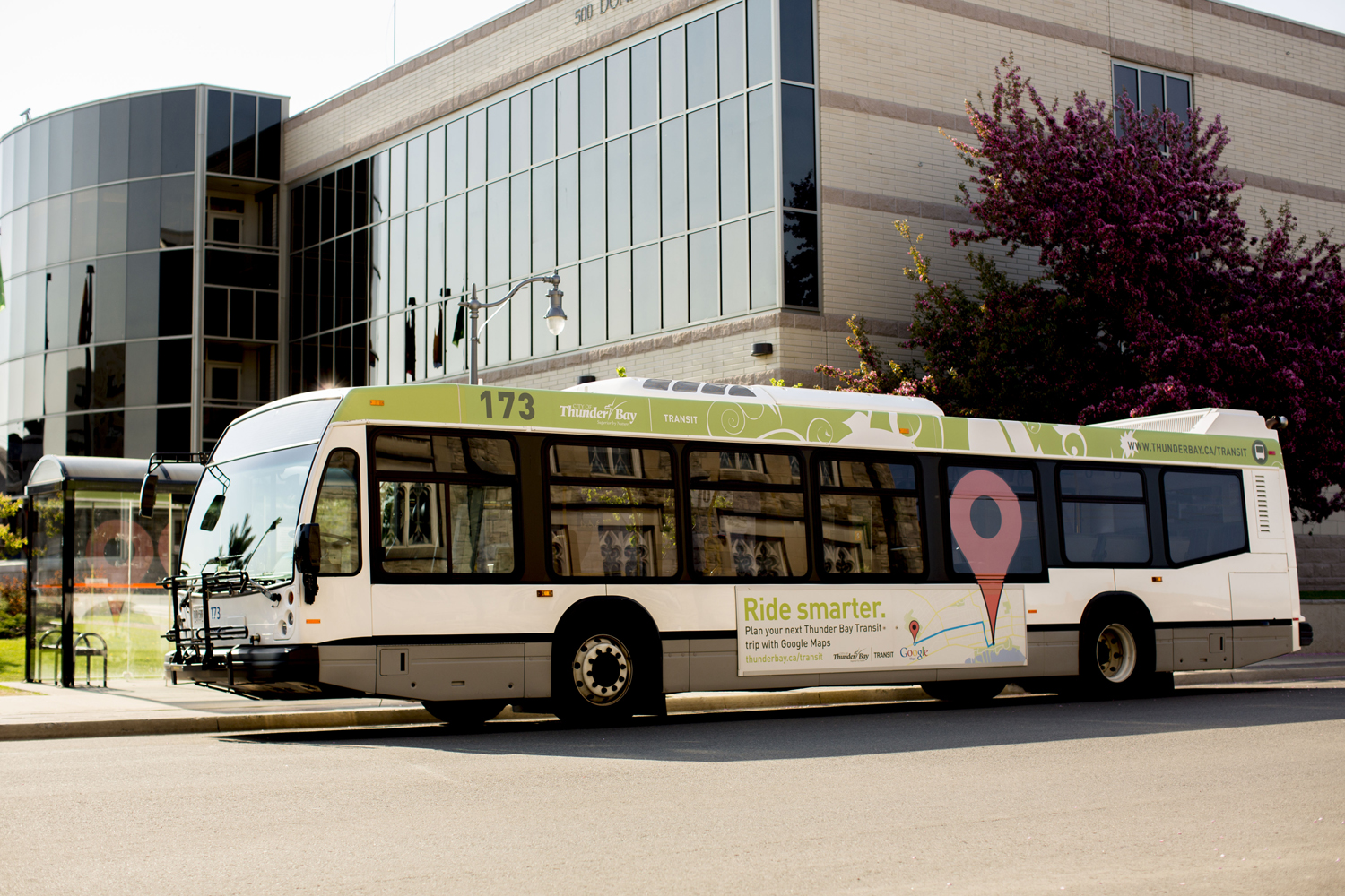 A photo shows a Thunder Bay Transit bus in front of City Hall